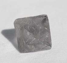 Load image into Gallery viewer, Fluorite Octahedron - slightly cloudy 1 inch size