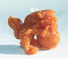 Load image into Gallery viewer, Foo Dog Beeswax Candle in True Orange 2 inches high