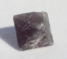 Load image into Gallery viewer, Fluorite Octahedron - slightly cloudy 1 inch size