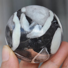 Load image into Gallery viewer, Coral Shell Jasper Sphere looks like a piece of abstract art 50mm wide