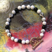 Load image into Gallery viewer, Howlite and Obsidian 6.5mm Round Bead Bracelet 7-3/4&quot; Gold Clasp