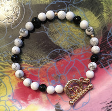 Load image into Gallery viewer, Howlite and Obsidian 6.5mm Round Bead Bracelet 7-3/4" Gold Clasp
