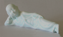 Load image into Gallery viewer, Reclining Buddha Celadon Glazed Porcelain Figurine