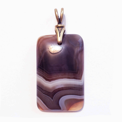 Fantastic Brown Botswana Banded Agate Pendant in oblong shape with Bronze Swivel Bail