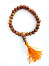 Load image into Gallery viewer, Sandalwood Mala Beads Bracelet stretches with orange tassel 8mm beads naturally aromatic