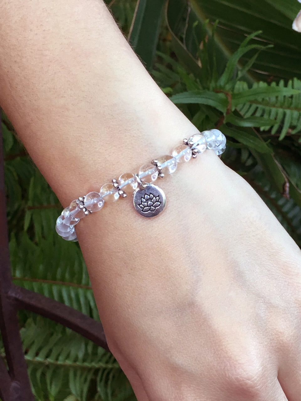 April Birthstone Clear Quartz Bracelet with a sterling silver lotus