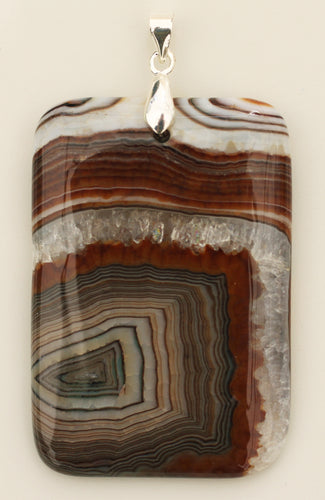Brown Onyx Pendant in oblong shape with sterling silver bail