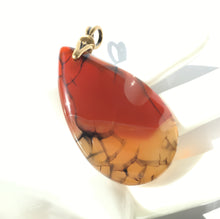 Load image into Gallery viewer, Carnelian Pendant with Brass Plated Pewter Bail in Art Deco motif