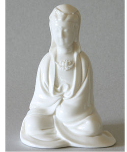 Seated Kwan Yin figurine in Cloak Blanc de Chine