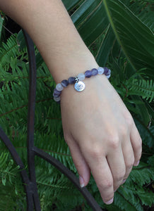 February Birthstone Amethyst and Rose Quartz Bracelet with sterling silver spacers and lotus charm