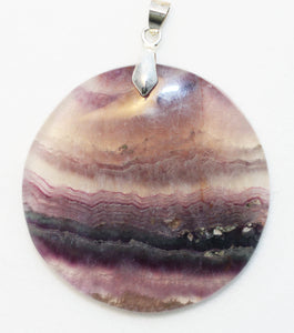 Fluorite Pendant in muted green and purple.