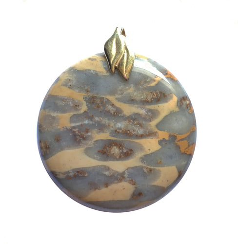 Fossilized Coral pendant with a gold plated brass double leaf bail