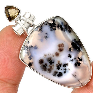 Merlinite pendant in shield shape with Smoky Quartz