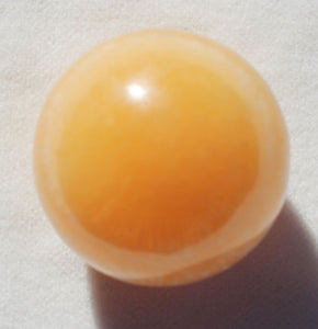 Orange Calcite 1-3/8 inches Sphere great for channelling and for kidney health