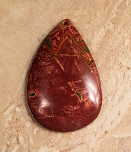 Picasso Stone Bead in burnt sienna pear shape perfect as a focal bead.