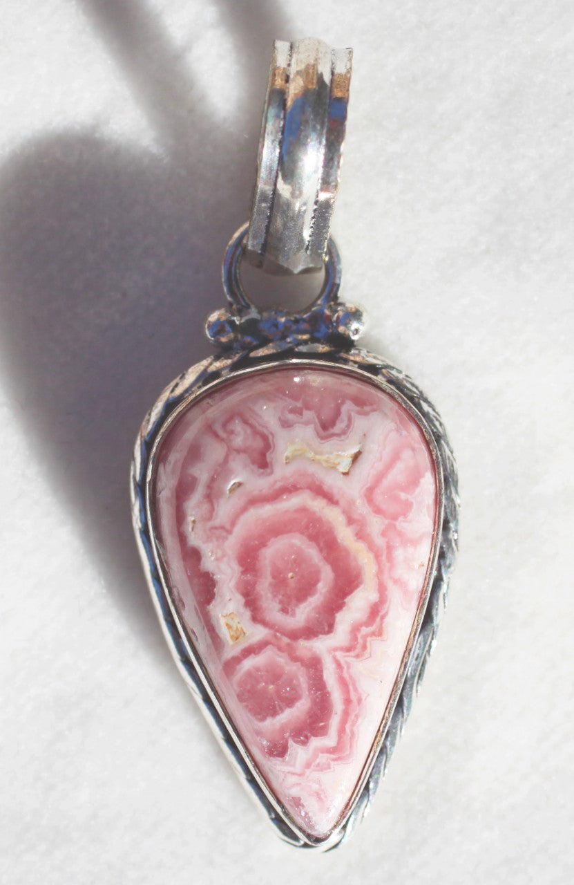 Rhodochrosite Pendant in petal shape with exceptional patterning in Sterling Silver plated Copper Setting