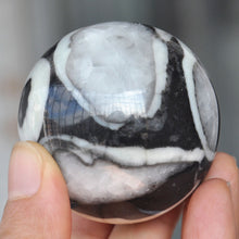 Load image into Gallery viewer, Coral Shell Jasper Sphere looks like a piece of abstract art 50mm wide