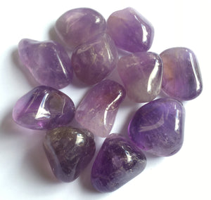 Amethyst tumbled amethyst stones from Brazil in half pound lot