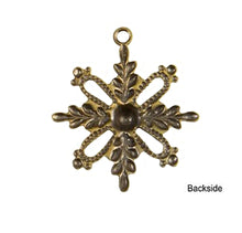 Load image into Gallery viewer, Oxidized Brass Snowflake Charm by TierraCast