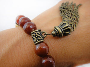 Carnelian, Bone and Brass Stretch Bead Bracelet with Chain Tassel