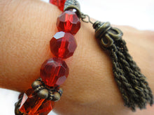 Load image into Gallery viewer, Carnelian, Glass Crystal, Wood and Brass Stretch Bead Bracelet with Chain Tassel