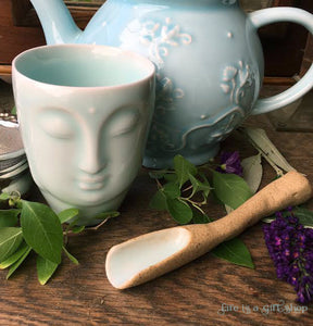 Celadon Glazed Porcelain Buddha Face Cup