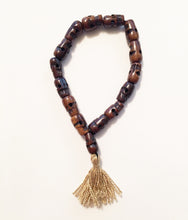 Load image into Gallery viewer, Dark Stained Skull Bracelet of Yak Bone Beads Beaded Tassel Bracelet