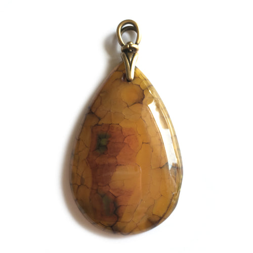 Dragon Veins Agate Pendant in honey hues with brass plated pewter bail.