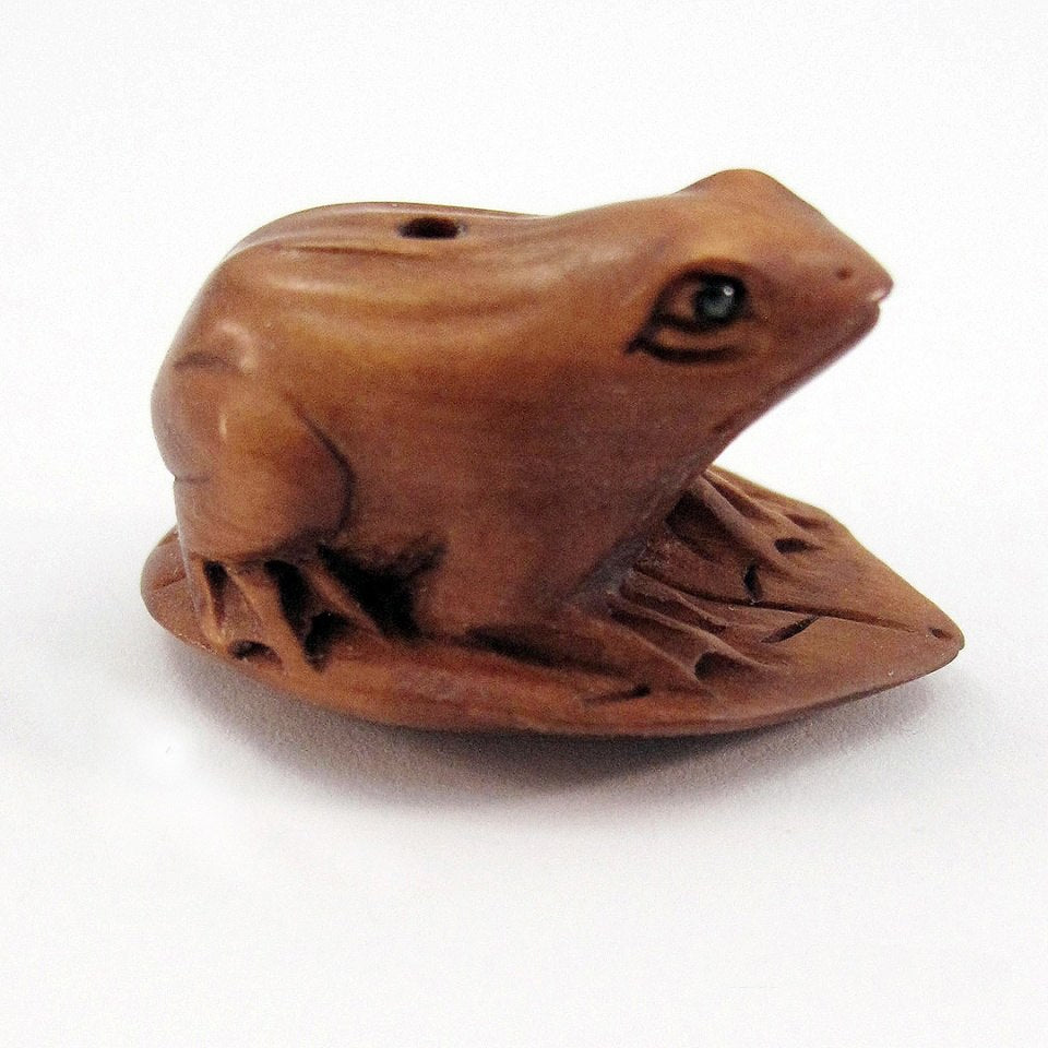 Frog Bead Boxwood Ojime Bead of frog on lotus pad