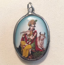 Load image into Gallery viewer, Krishna playing his flue with Nandi the Bull Enameled Brass Deity Pendant