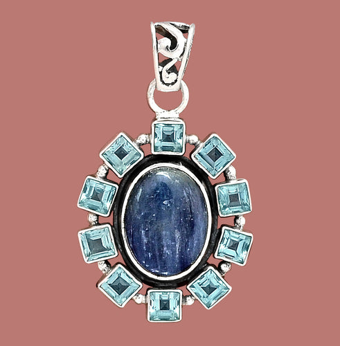 Blue Kyanite Pendant set with Blue Topaz Gems in a Sterling Silver Pendant