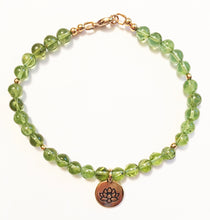 Load image into Gallery viewer, Peridot Bracelet with Lotus Charm - August Birthstone Bracelet