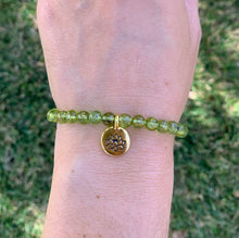 Load image into Gallery viewer, Peridot Bracelet with Lotus Charm - August Birthstone Bracelet