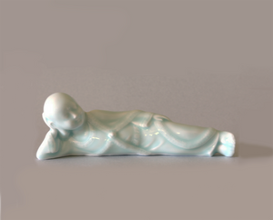 Reclining Buddha Celadon Glazed Porcelain Figurine