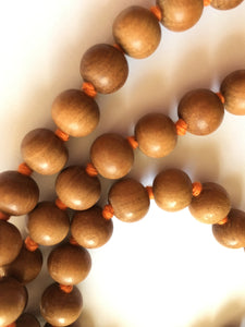 Sandalwood Mala 10mm Beads with Light Orange Tassel