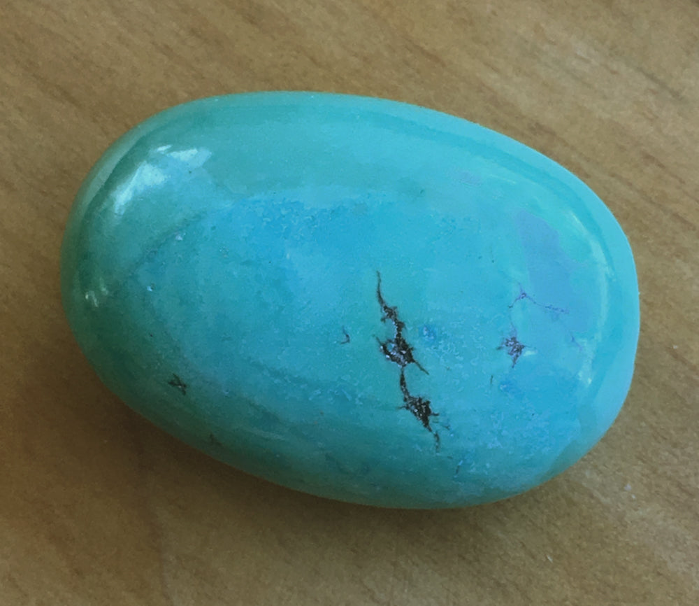 Turquoise Bead with a high luster